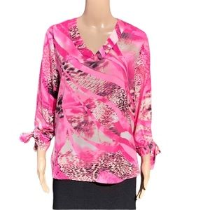 Bright pink animal print chiffon top with self tie bow at sleeve cuffs